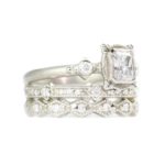 Picture frame ring with ribbed princess step and ribbed triangle bands